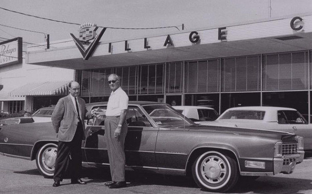 Car Salesman Speaks With Manager